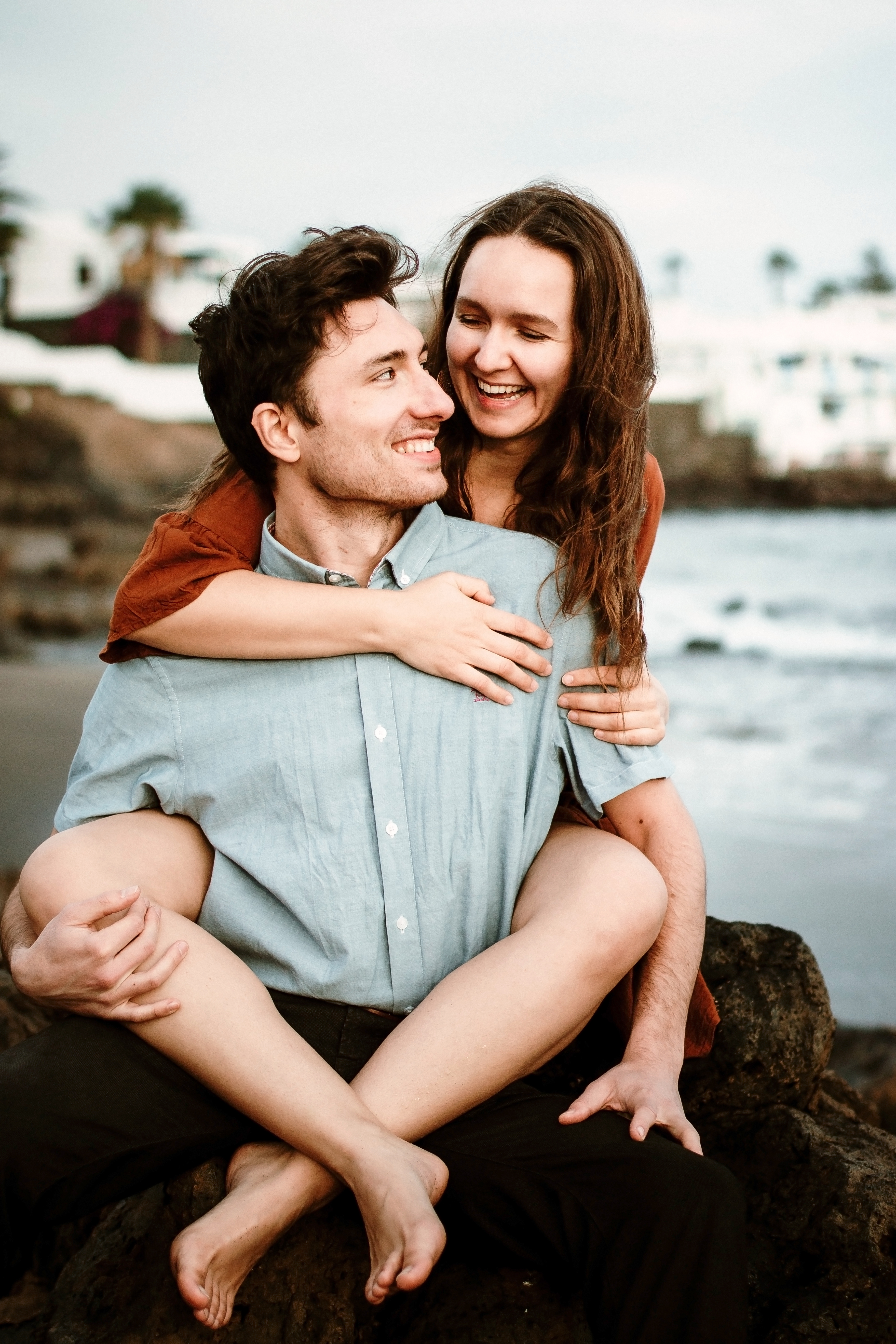 Puerto del Carmen beach winter couple photography: Lanzarote photographer captures beautiful and passionate moments of couple during sunset photo shoot