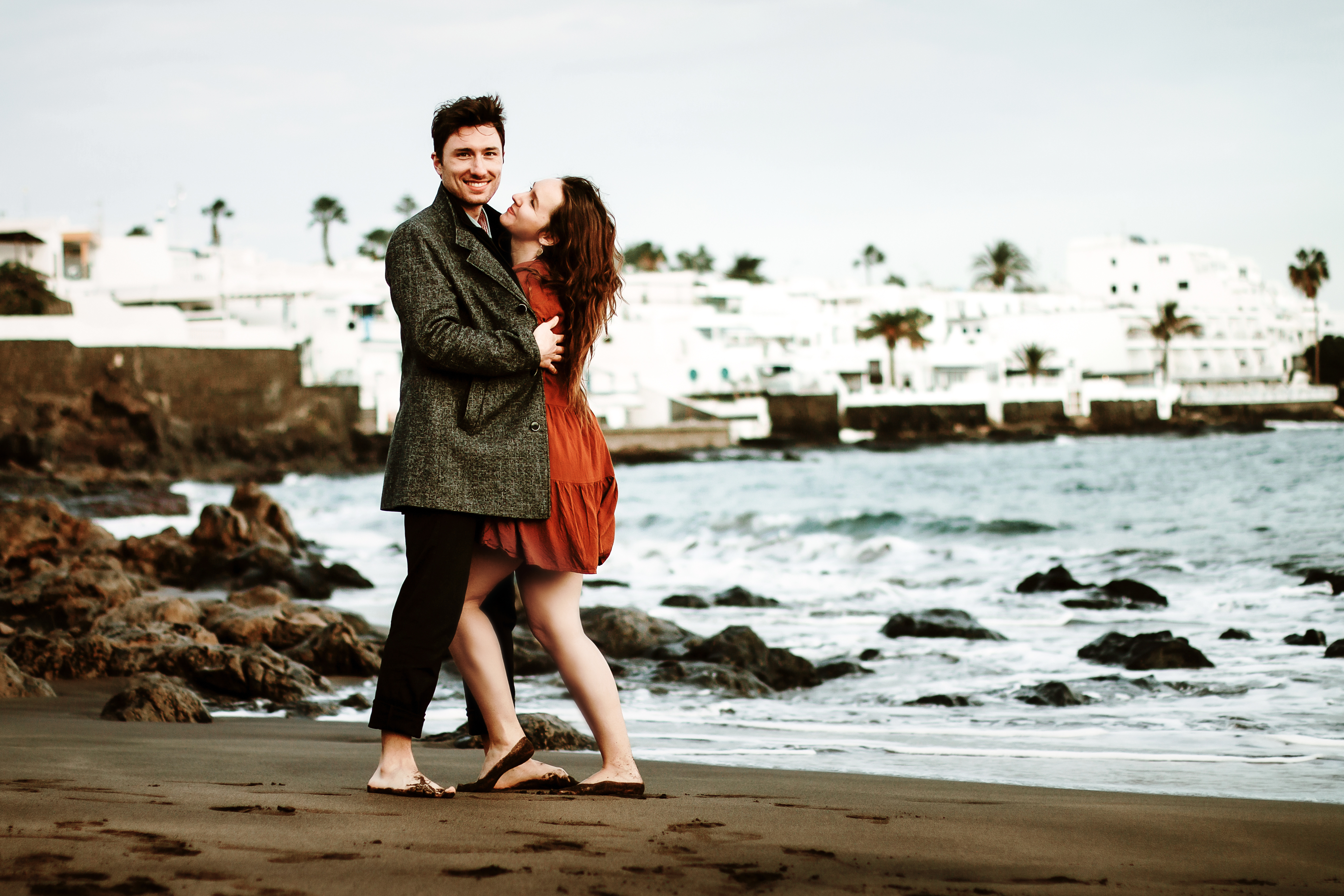Professional Lanzarote photography: Couple captured in lovely winter sunset photo shoot on Puerto del Carmen beach