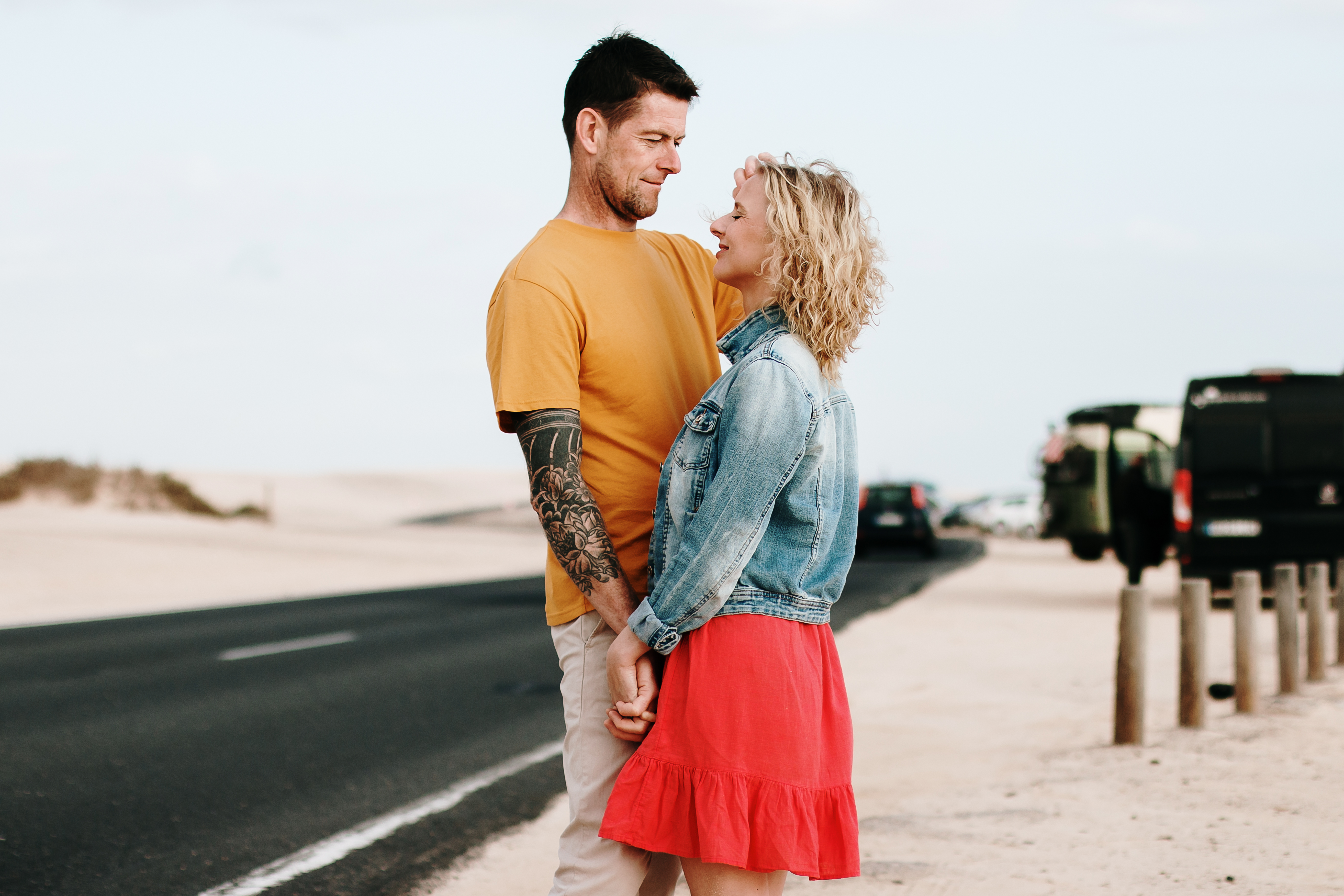 Professional Fuerteventura photography: Couple captured in stunning morning photo shoot on Grandes Playas - Dunes of Corralejo beach