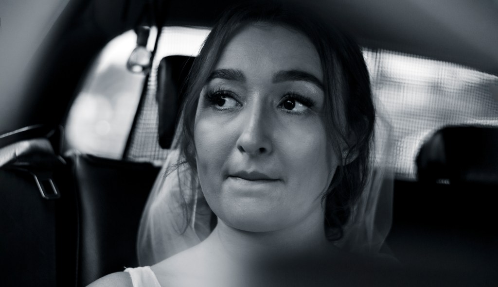 Bride is going by taxi to her weddings in Corralejo, Fuerteventura