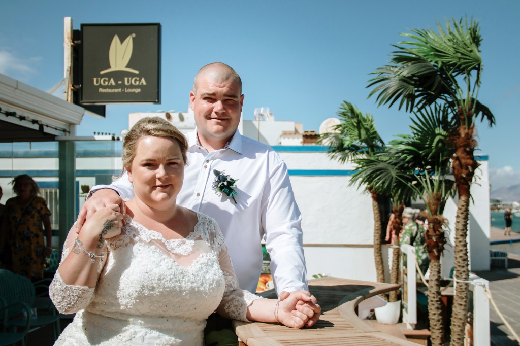 Scottish-Fuerteventura wedding fusion - professional photographer documents ceilidh dancing with Atlantic Ocean panorama