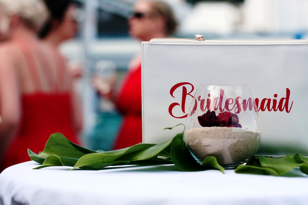 Premium Fuerteventura wedding photography - Scottish newlyweds toast at sunset with restaurant guests, Corralejo's waves in background