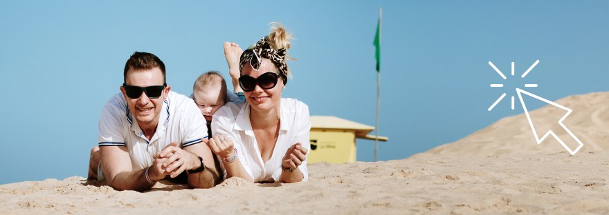 Capture your family's love and joy with our professional family photography services in Fuerteventura and Lanzarote. This beautiful photo features parents and their baby boy relaxing on the sand dunes of Corralejo, Fuerteventura. Our experienced photographer can create stunning images that preserve your cherished memories forever