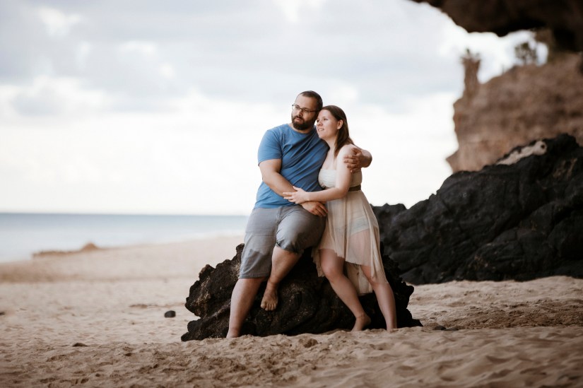 Wild and free elopement in Fuerteventura – couple celebrating love in the Atlantic Ocean at sunset